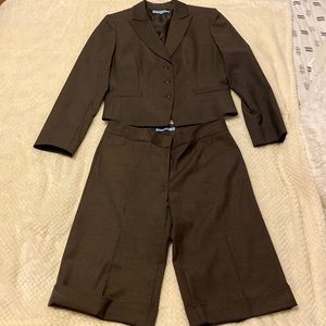 Women’s suit with blazer and wide leg capri dress pants.